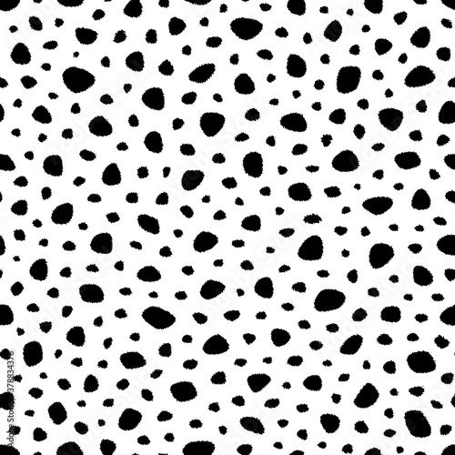 Random dots, animal skin, fur. Seamless pattern. Design for fabric, wallpaper. Background polka dot. Irregular random abstract texture with dots. Modern stylish texture. Repeating graphic backdrop