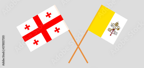 Crossed flags of Vatican and Georgia