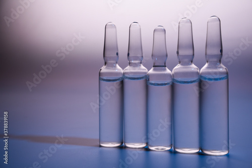 Copy space photo medical ampoules on a white background. Close-up