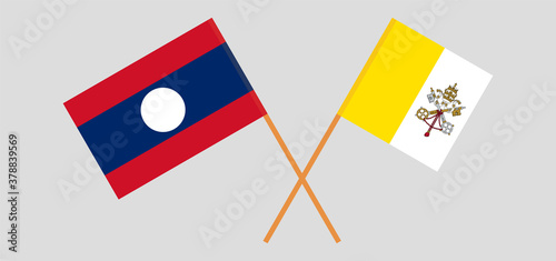 Crossed flags of Vatican and Laos
