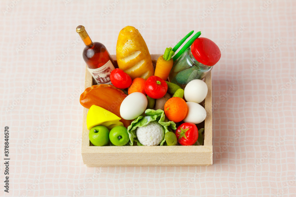 Wooden box with vegetables and grocery . Home delivery of food concept. Wooden box with vegetables and grocery . Home delivery of food concept.