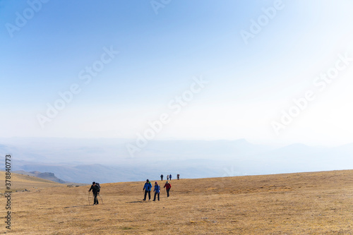 people hiking in the mountain