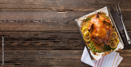 Banner Thanksgiving chicken on wooden table gala dinner,top view