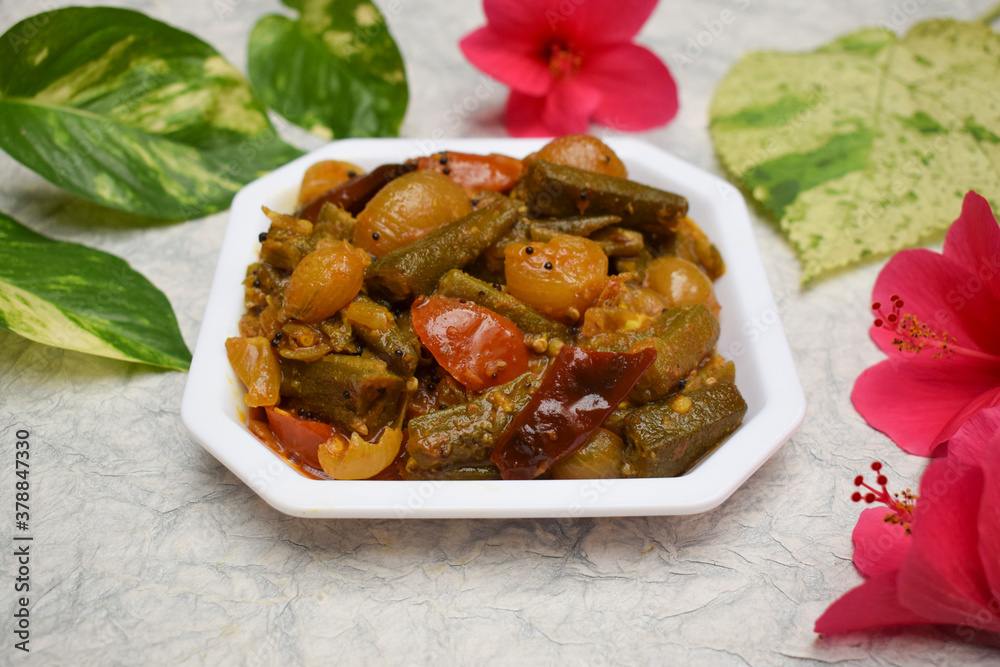 Top view of Indian vegetable curry Bhindi do pyaza made of whole big