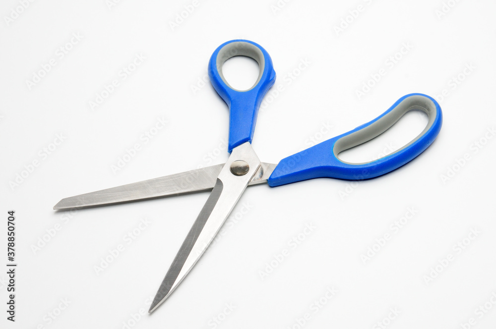 Tailors scissors on a white background Tailors scissors on a white background