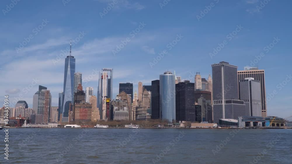 New York city skyline. Manhattan downtown with many skyscrapers shot from the Hudson river New York city skyline. Manhattan downtown with many skyscrapers shot from the Hudson river