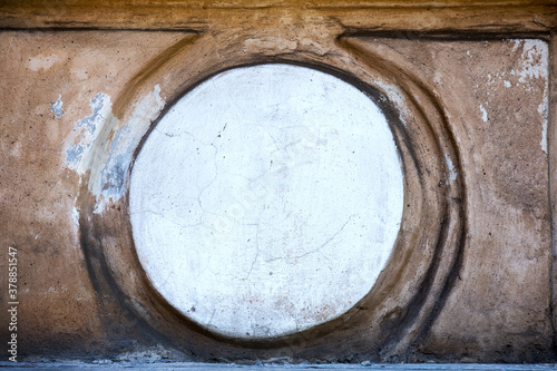 Abstract concrete, weathered with cracks and scratches. Remains of paint different colors on wall. Landscape style. Grunge Concrete Surface. Great background or texture.