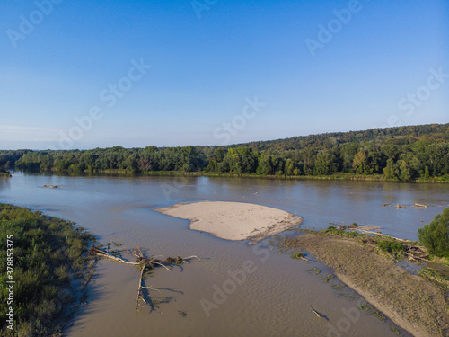Driftwood and gravel at Drava River near Legrad in Croatia And Ortilos in Hungary, aerial view wild europe nature