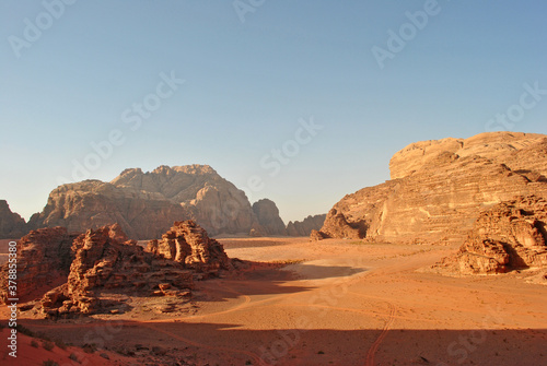 Evening landscape of the Wadi Rum desert. Sandstone rocks and sand valley.