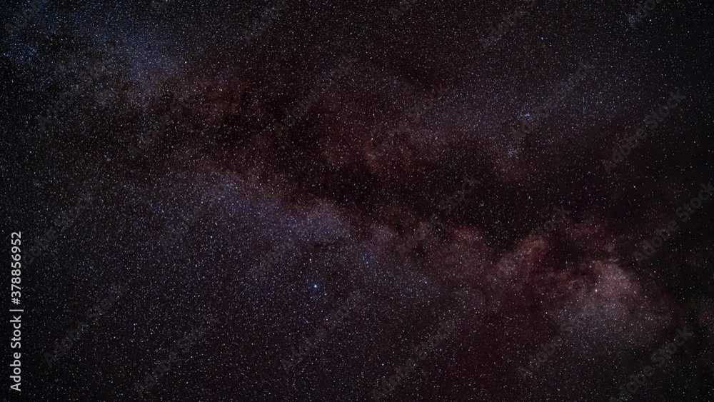 Night sky timelapse, many stars with satellites passing by, Milky way in region of Aquila and Sagitta constellation with bright Altair star visible Night sky timelapse, many stars with satellites passing by, Milky way in region of Aquila and Sagitta constellation with bright Altair star visible
