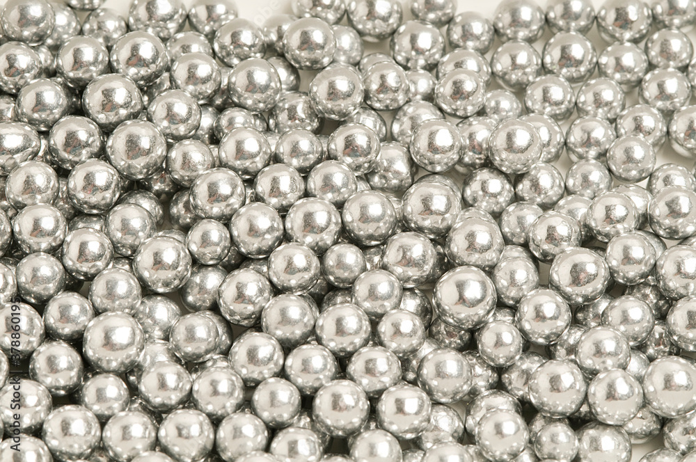 Close-up of silver-plated candies