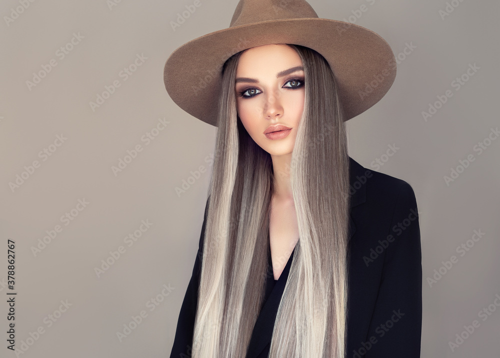 Beautiful girl in a hat with long blonde straight hair . Fashionable coloring of shatush. Beauty, cosmetics and fashion
Beautiful girl in a hat with long blonde straight hair . Fashionable coloring of shatush. Beauty, cosmetics and fashion
