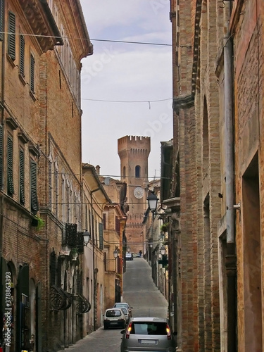 Italy, Marche, Ostra downtown medieval street. The place is warm and attractive.