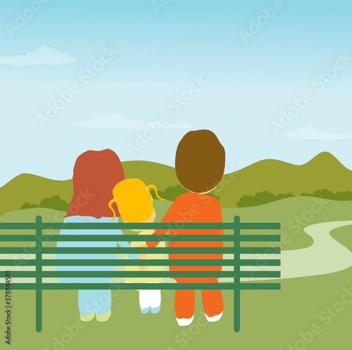 Rear view of parents and their daughter sitting on a park bench