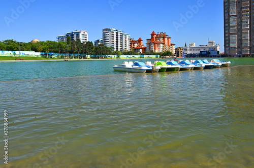 Catamarans on an artificial lake in the park 