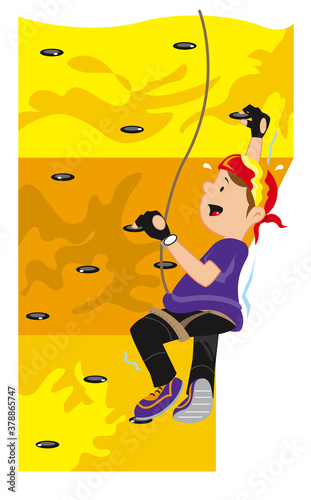 Side profile of a boy rock climbing