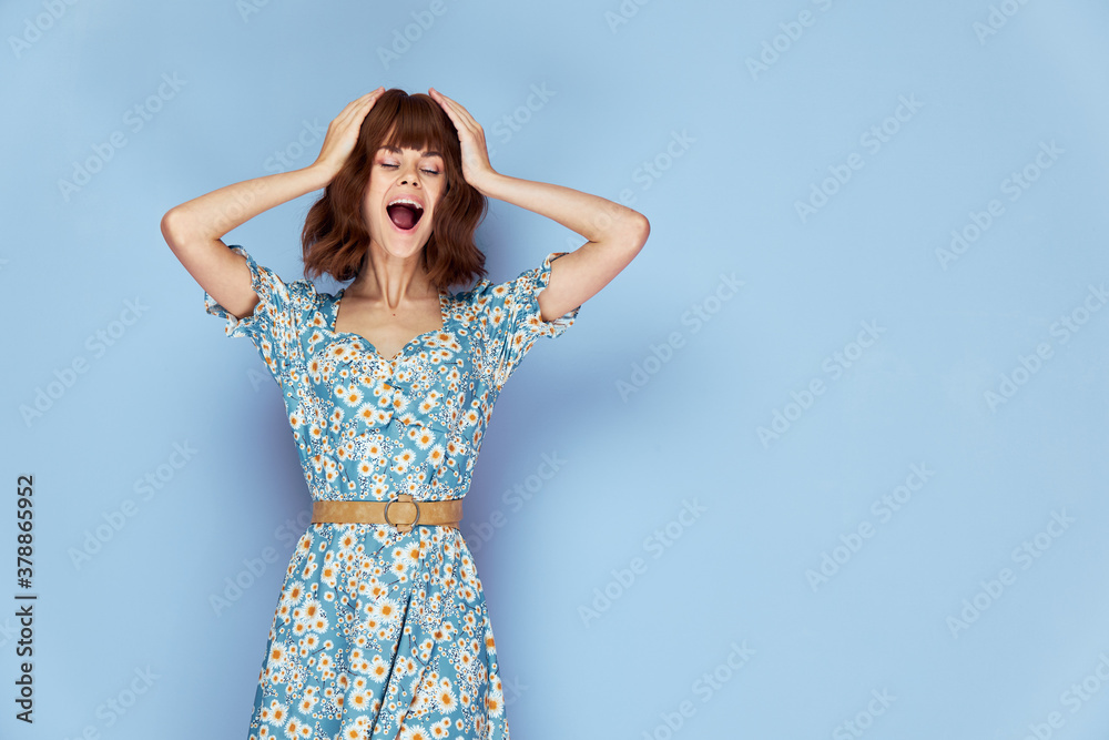 Woman in dress Holding his head closed eyes open mouth emotions summer clothes Woman in dress Holding his head closed eyes open mouth emotions summer clothes