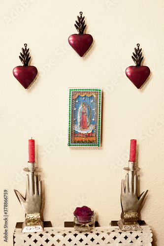 Candles with showpieces on an altar photo