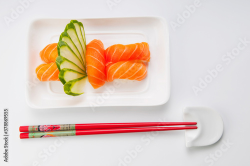 High angle view of sushi with chopsticks