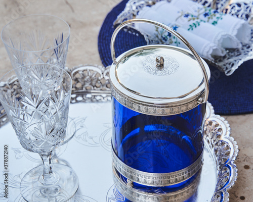 silver and blue ice container table decoration