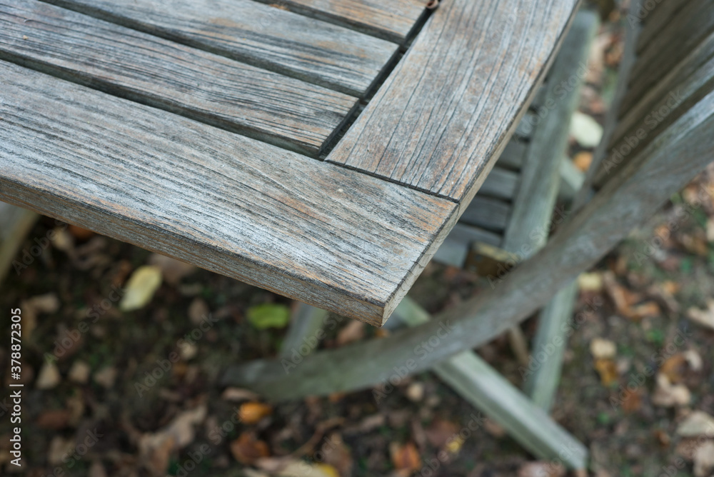 Naklejka premium closeup of Teak garden furniture in the private garden