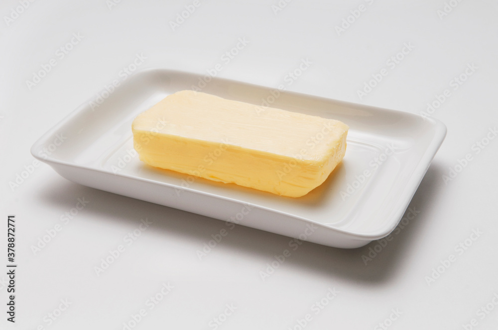 Close-up of butter on a white tray Close-up of butter on a white tray