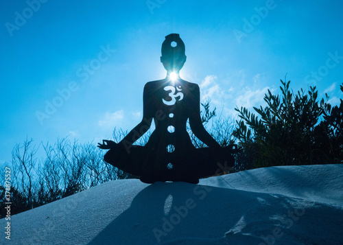 yoga position silhouette in contrasting sun, Throat chakra