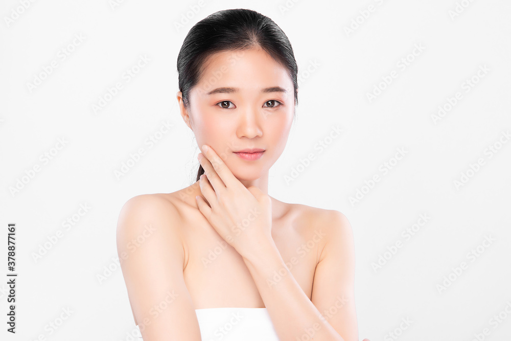 Beautiful young asian woman with clean fresh skin on white background, Face care, Facial treatment, Cosmetology, beauty and spa, Asian women portrait Beautiful young asian woman with clean fresh skin on white background, Face care, Facial treatment, Cosmetology, beauty and spa, Asian women portrait