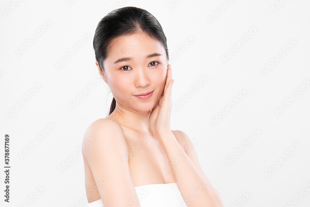 Beautiful young asian woman with clean fresh skin on white background, Face care, Facial treatment, Cosmetology, beauty and spa, Asian women portrait Beautiful young asian woman with clean fresh skin on white background, Face care, Facial treatment, Cosmetology, beauty and spa, Asian women portrait