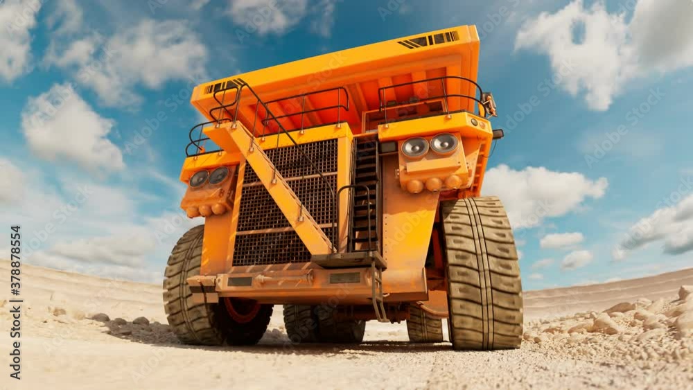 Animation of the yellow dump truck driving through the vast dig site. 4K HD