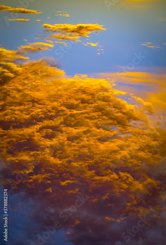 Sunset sky for abstract natural background. Beautiful color  blue and orange clouds in the sky. 