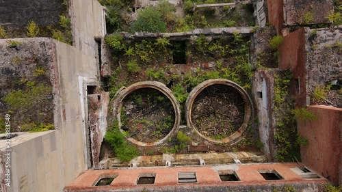 View from above. The camera flies past the abandoned plant of the Khrustalnensky mining and processing plant in the village of Khrustalny, Primorsky Territory. Abandoned tin mining plant photo