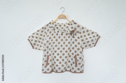 woman clothes polka dot blouse on white background