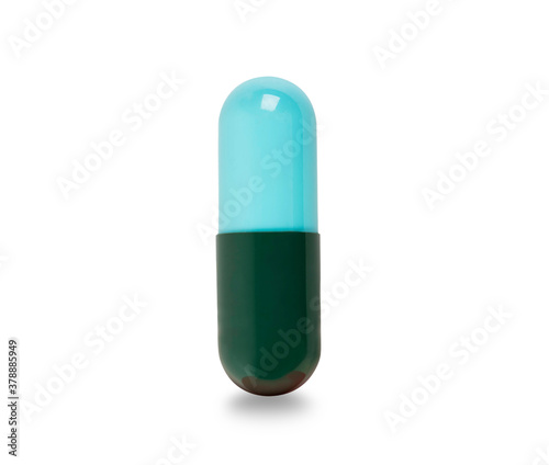 Green pill isolated on white background