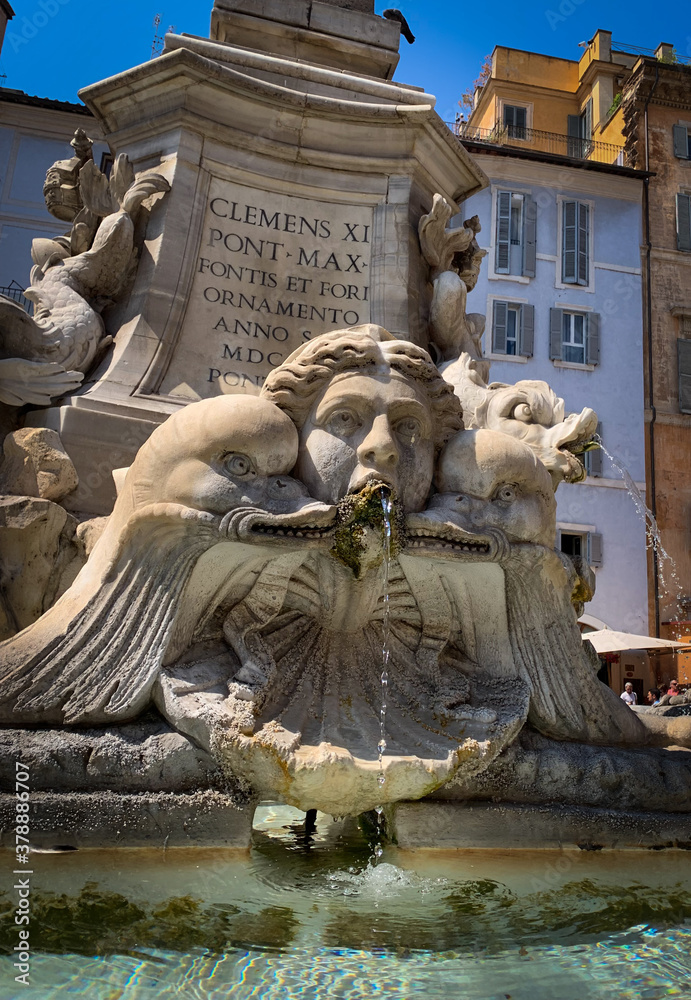Close up view of detail on ancient roman fountain Fontana del Pantheon at Piazza della Rotonda in Rome, Italy