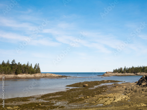 Fototapeta Naklejka Na Ścianę i Meble -  Beautiful day on the shores of Saint Lawrence river, Bic National park, Quebec, Canada