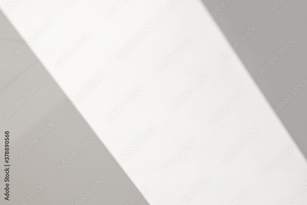 Light from sunlight with abstract window shadow overlay on empty white wall texture background, architect geometric construction pattern on gray building for template presentation and any design Light from sunlight with abstract window shadow overlay on empty white wall texture background, architect geometric construction pattern on gray building for template presentation and any design