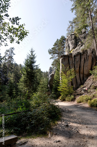 Hiking path through the majestic sandstone rock walls. Adrspach rock city, Czech Republic, Europe