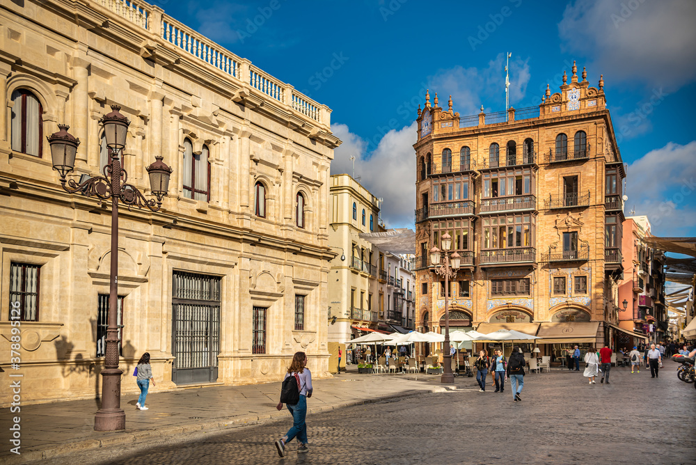 Seville, Spain. Plaza de San Francisco with the beautiful baroque and neoclassical building on the left, sit of the Town Hall.