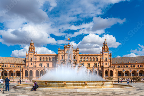 Seville, Spain. October 14th, 2019. Plaza de España with tourists strolling admiring the amazing palace and fountain.