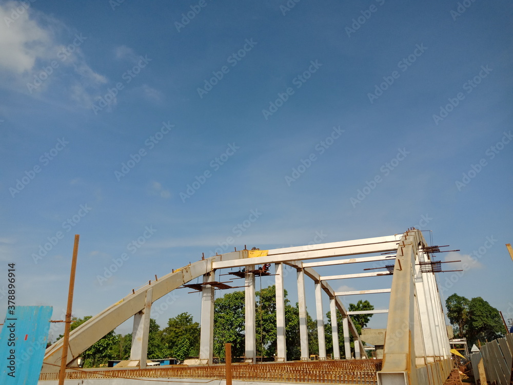 Iron made bridge on sky background. Iron made bridge on sky background.