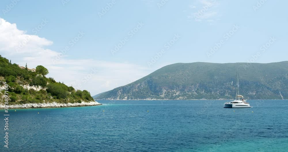 Beautiful landscape with green forest and emerald water lagoon of Foki Fiskardo beach, Kefalonia, Ionian islands, Greece. Beautiful landscape with green forest and emerald water lagoon of Foki Fiskardo beach, Kefalonia, Ionian islands, Greece.
