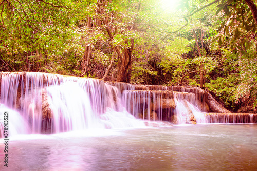 Huay Mae Khamin Waterfalls  Srinakarin Dam National Park  Si Sawat District  Kanchanaburi  Thailand  Beautiful landscape of waterfall with sunset light in dark forest