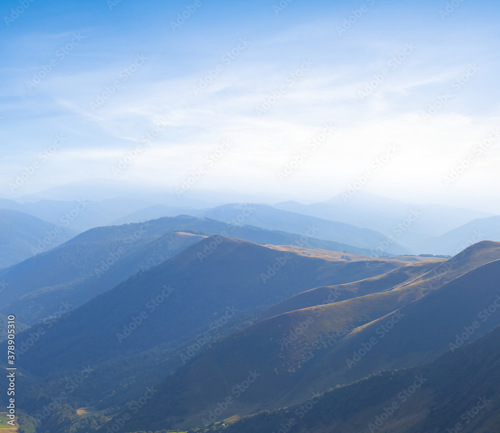 mountain ridge in a blue mist, outdoor mountain travel background