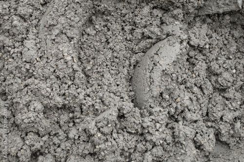 Texture of ready mixed concrete cement mortar for building as grey background.
