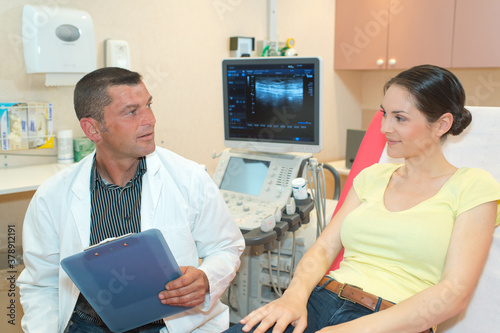 a gynecologist with female patient