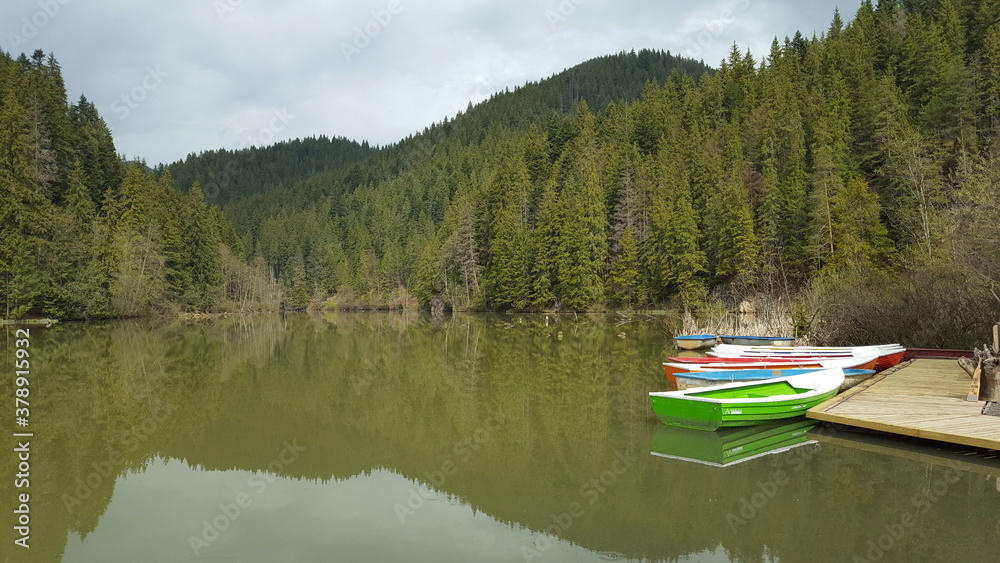 Obraz premium Boats on the Red lake,Lake Ghilcos,Harghita,Romania.2017