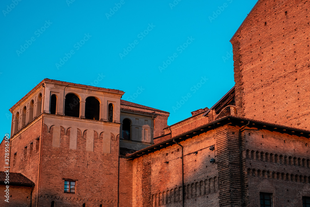 Sunset over the ancient buildings of Piacenza, Italy