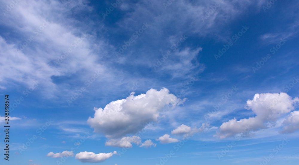 Obraz premium White clouds on blue sky background.