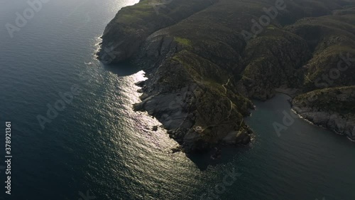 Aerial view on Mediterranean sea coast with lighthouse, Cadaques, Catalonia, Spain